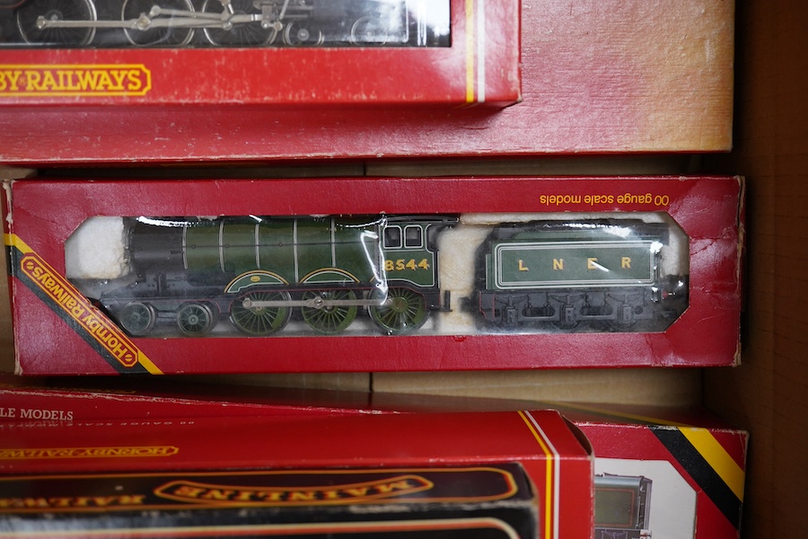 Six boxed 00 gauge railway locomotives by Hornby Railways, etc. including; a BR Class B17/4 (R.133), a BR Coronation Class, a BR Class A4 (R.350), an LNER Class B12/3 (R.150), a BR Class 9F (R.550) and a BR Patriot Class